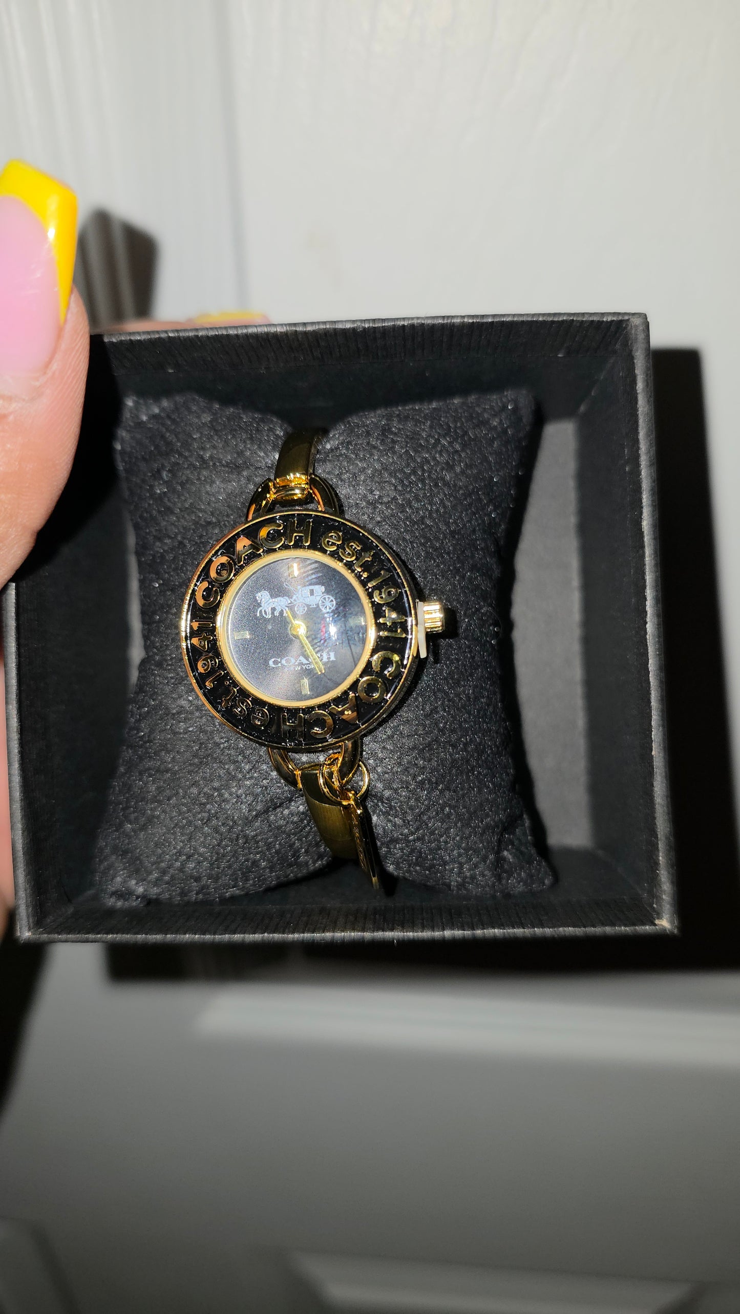 Gold Coach Black
